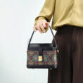 model-holding-song-brocade-bag-front