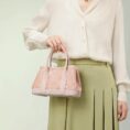 song-brocade-pink-dingsheng-crossbody-bag-model-green-dress-handheld